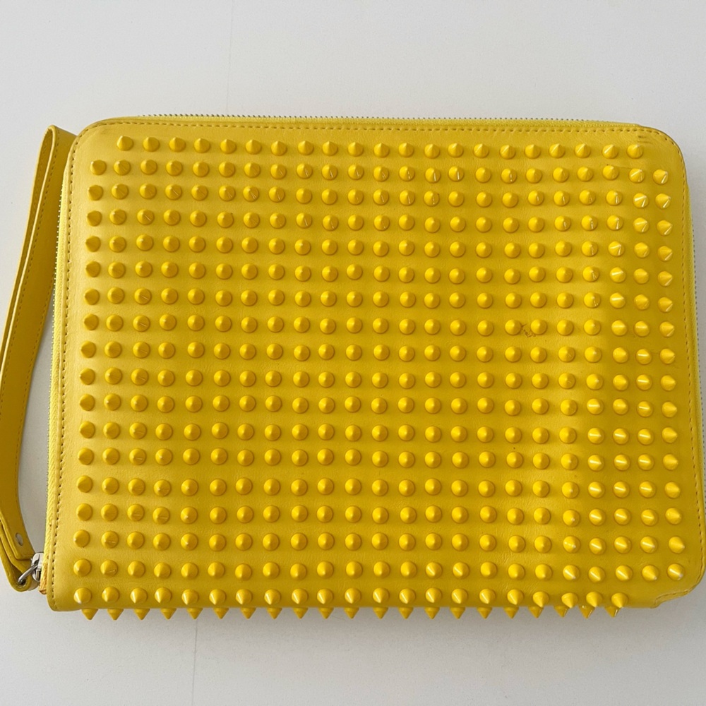Christian Louboutin Cris Case iPad portfolio in Yellow leather with cone spikes